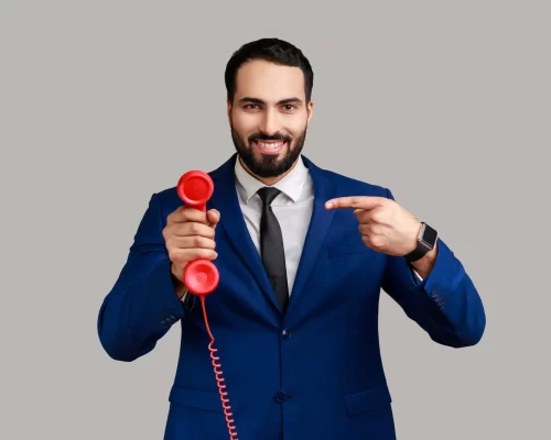 bearded-man-pointing-finger-handset-red-vintage-landline-phone-interested-retro-devices-answering-calls-wearing-official-style-suit-indoor-studio-shot-isolated-gray-background